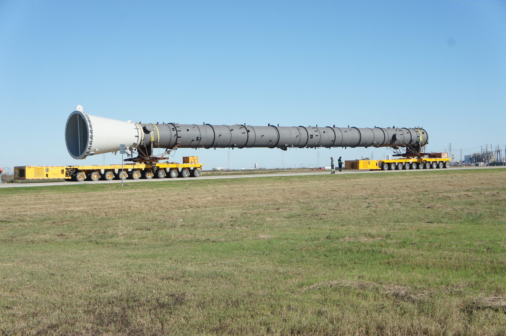 Large fabricated column loaded on a multi-axle transporter